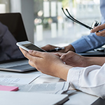 Man Using Laptop On Table - GettyImages