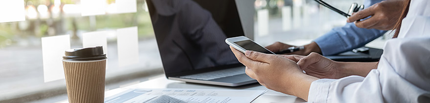 Man Using Laptop On Table - GettyImages - banner